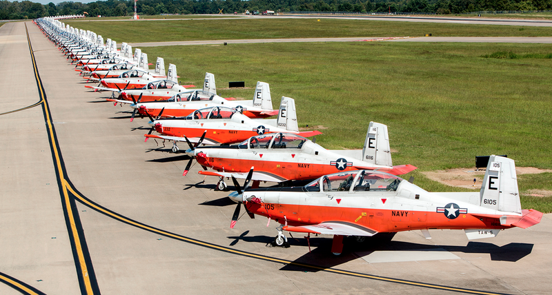 Dozens of T-6 Texan trainers are seen parked at Clinton National Airport in Little Rock. (Photo by Karen Segrave)