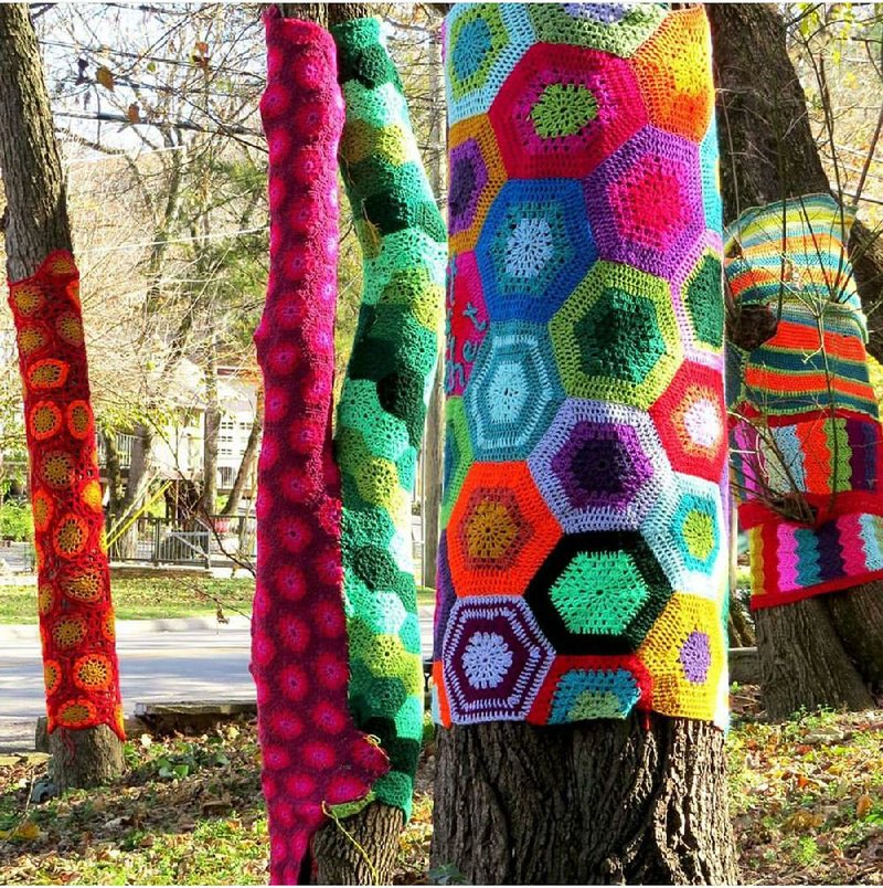 The afghans that wrapped these trees in Eureka Springs’ North Main Music Park were the work of local artist Gina Gallina, who saw they were missing Aug. 31. 