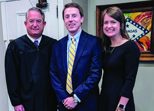 Shepherd, center, was sworn in as the new prosecutor for the 13th Judicial District, by Fourth Division Circuit Judge Robin Carroll. Shepherd’s wife, Molly, was one of several family members to attend the ceremony Tuesday.