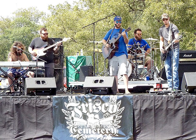 Photo by Randy Moll Frisco Cemetery took to the stage Saturday afternoon to kick off the Saturday festivities at the Cool Water Music Festival near Gravette.