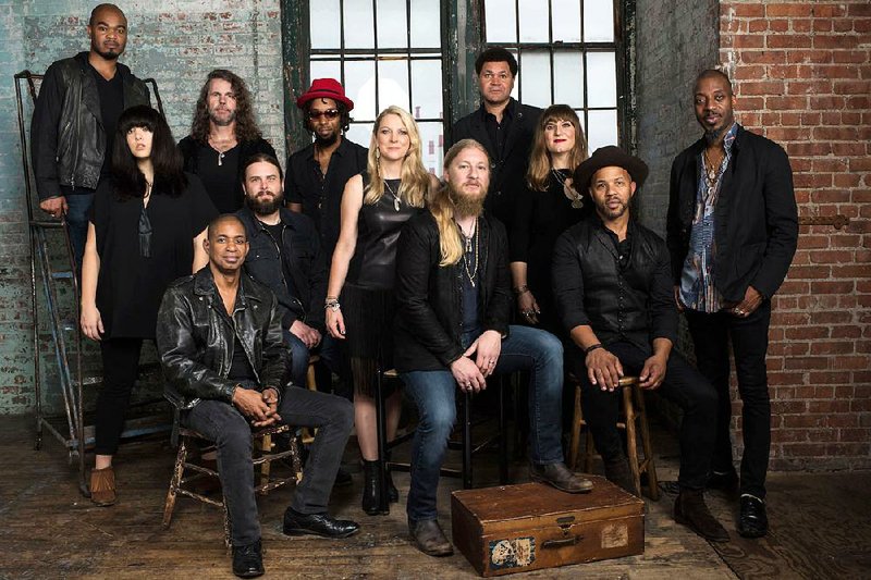 The Tedeschi Trucks Band, led by Susan Tedeschi (center, standing) and her husband, Derek Trucks (center, seated), will play at Robinson Center Performance Hall in Little Rock on Sunday.
