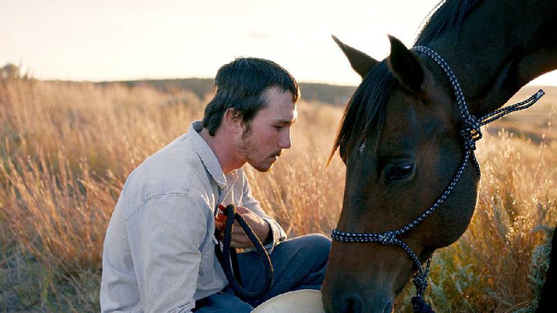 Ex-rodeo rider Brady Jandreau plays horse whisperer Brady Blackburn in Chloe Zhao’s The Rider.