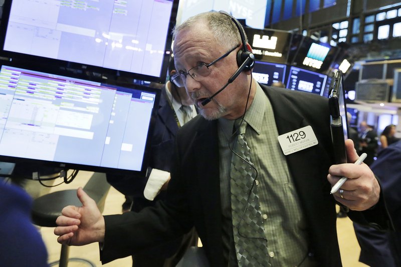 Trader Robert Moran works on the floor of the New York Stock Exchange, Thursday, Sept. 14, 2017. U.S. stocks are falling Thursday morning after finishing at record highs the last two days. (AP Photo/Richard Drew)