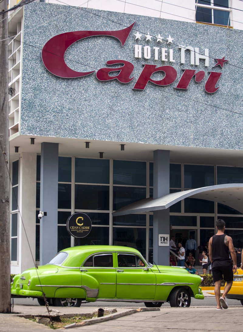 In this Sept. 12, 2017, photo, the Hotel Capri in Havana, Cuba. New details about a string of mysterious "health attacks" on U.S. diplomats in Cuba indicate the incidents were narrowly confined within specific rooms or parts of rooms. Aside from their homes, officials said Americans were attacked in at least one hotel, the recently renovated Hotel Capri, steps from the Malecon, Havana's iconic, waterside promenade.(AP Photo/Desmond Boylan)