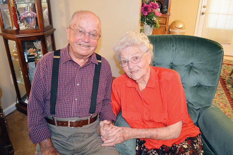 Coy and Rosa Shirley of Mayflower pose in their home in 2016 before their 74th wedding anniversary. The couple will celebrate their 75th anniversary Wednesday. “Seventy-five years is unbelievable,” Rosa said.