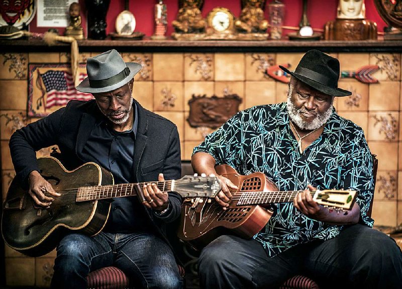 TajMo — Keb’ Mo’ (left) and Taj Mahal — perform Tuesday at Fayetteville’s Walton Arts Center.
