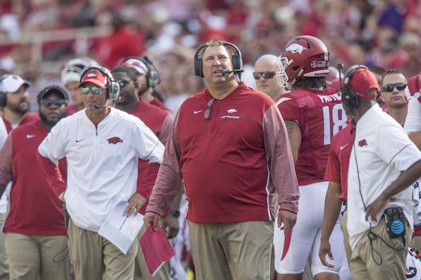 Arkansas offensive coordinator Dan Enos (left) and coach Bret Bielema on the sideline as the Razorbacks take on TCU Saturday, Sept. 9, 2017, during the game at Razorback Stadium in Fayetteville. 