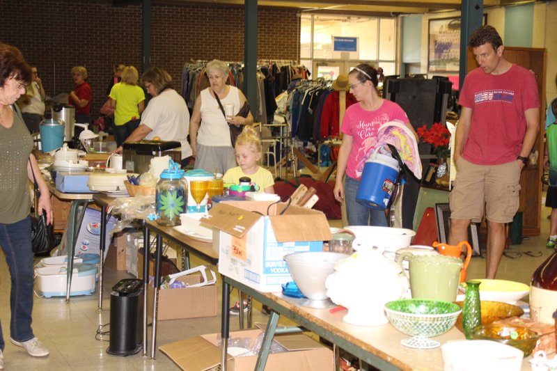 Sale: Shoppers rummage through items during a sale benefitting the Union County Animal Protection Society (UCAPS).