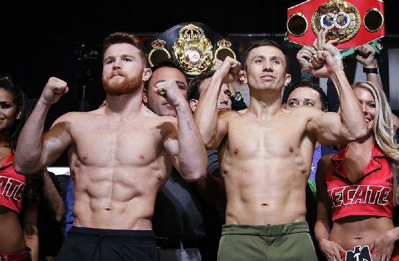 Gennady Golovkin (right) of Kazakhstan and Canelo Alvarez of Mexico pose after Friday’s weigh-in for tonight’s world middleweight title fight in Las Vegas. “It’s a true fight,” Golovkin said. “You can go back home or go to the hospital.” 
