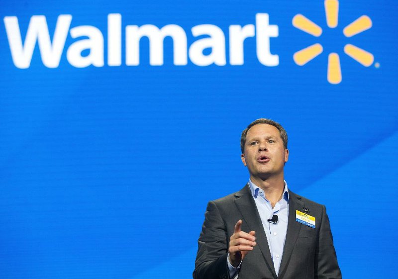 Doug McMillon, Wal-Mart president and chief exeuctive officer, speaks during the Wal-Mart Shareholders Meeting Friday, June 2, 2017, at Bud Walton Arena in Fayetteville