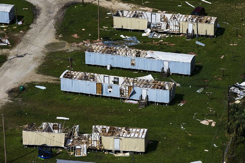 Damaged homes are shown Saturday in Immokalee, Fla., days after Hurricane Irma. 