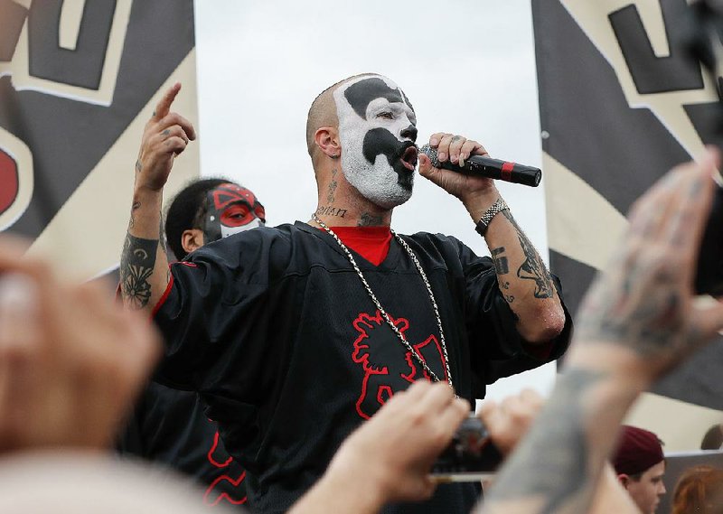 Shaggy 2 Dope, a member of the rap group Insane Clown Posse, speaks to juggalos, as supporters of the group are known, in front of the Lincoln Memorial in Washington during a rally Saturday. 