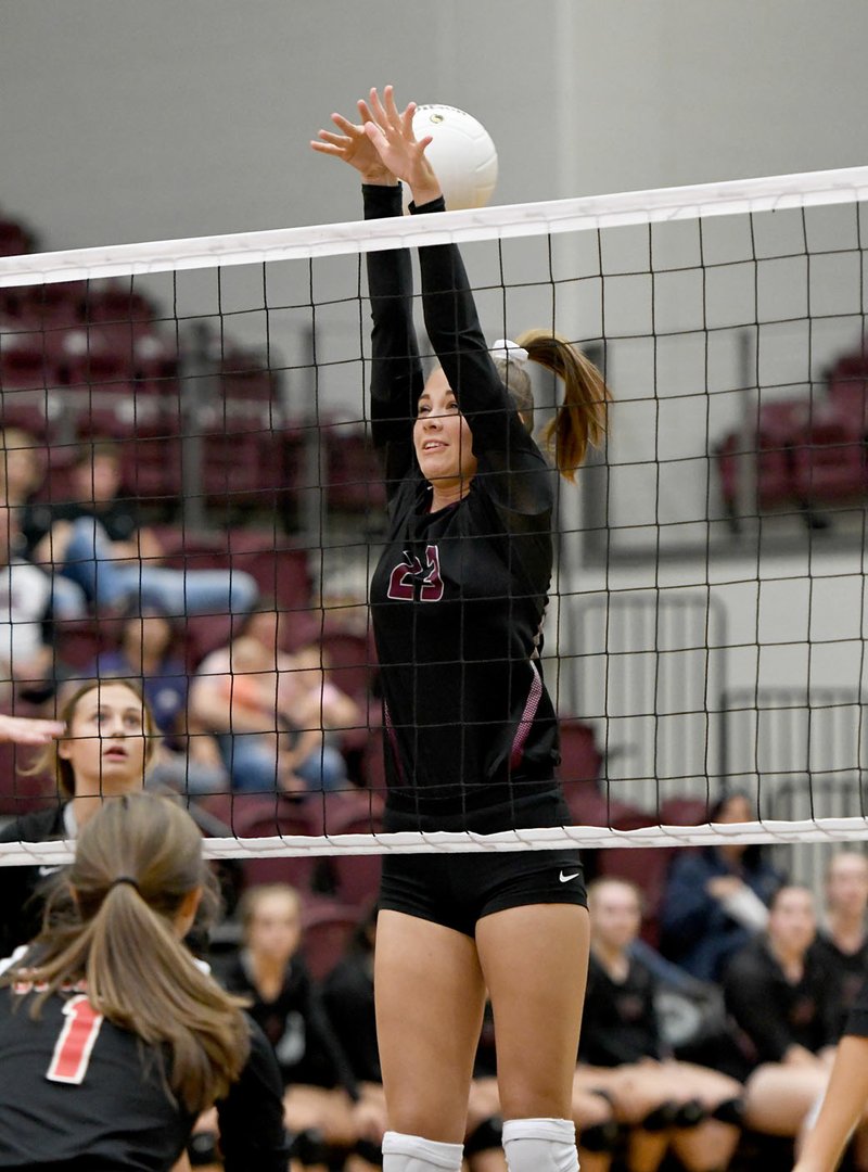 Bud Sullins/Special to Siloam Sunday Siloam Springs senior Kenlie Noel went up for a block Tuesday in the Lady Panthers&#8217; 3-0 win at home against Russellville.