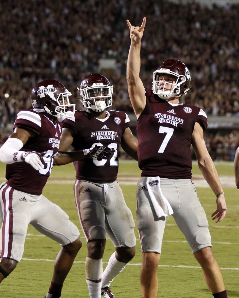 Mississippi State quarterback Nick Fitzgerald (7) celebrates his three-yard touchdown run against LSU during the first half of their NCAA college football game against in Starkville, Miss., Saturday, Sept. 16, 2017. 