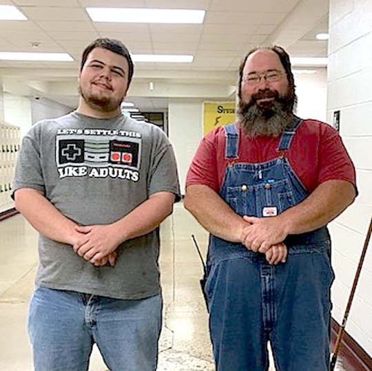 Submitted photo Lake Hamilton High School student Max Barr, left, works with David Pennington in maintenance in the second year of the Students Transitioning to Employment Program, which partners with area businesses and careers for students to gain work experience through internships.