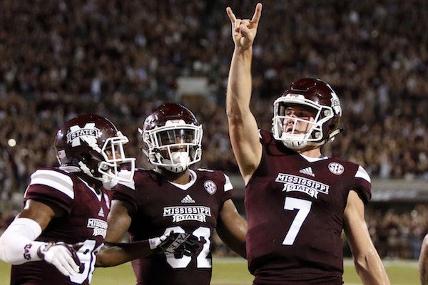 Mississippi State quarterback Nick Fitzgerald (7) celebrates his three-yard touchdown run against LSU during the first half of their NCAA college football game against in Starkville, Miss., Saturday, Sept. 16, 2017. (AP Photo/Rogelio V. Solis)