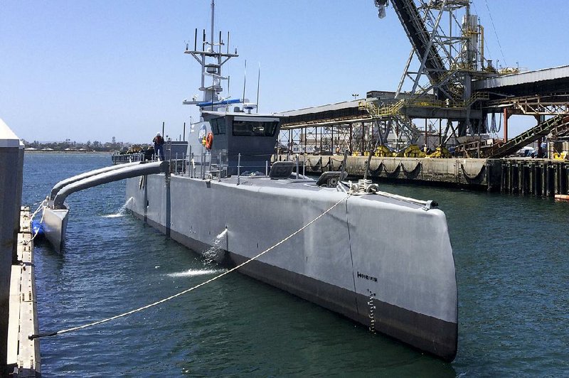 The Sea Hunter, seen at a maritime terminal in San Diego in this fi le photo, is an unmanned surface vessel being tested by the Pentagon to travel thousands of miles out at sea without a single crew member on board.
