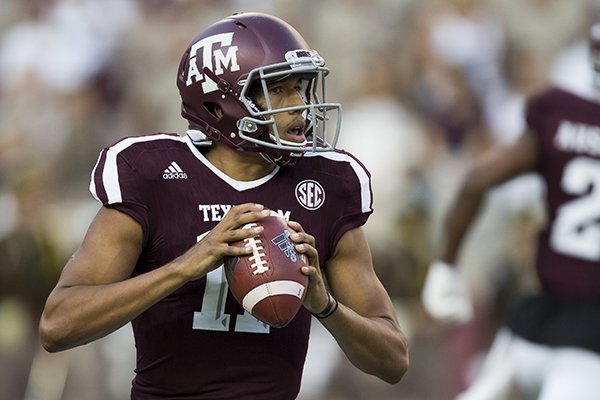 Texas A&M quarterback Kellen Mond (11) looks to pass against Nicholls State during the first quarter of an NCAA college football game Saturday, Sept. 9, 2017, in College Station, Texas. (AP Photo/Sam Craft)

