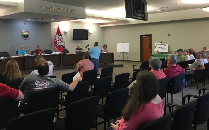 NWA Democrat-Gazette/APRIL WALLACE
It was a full house at Lowell Planning Commission last night. Residents showed up to protest a manufactured homes development in town.