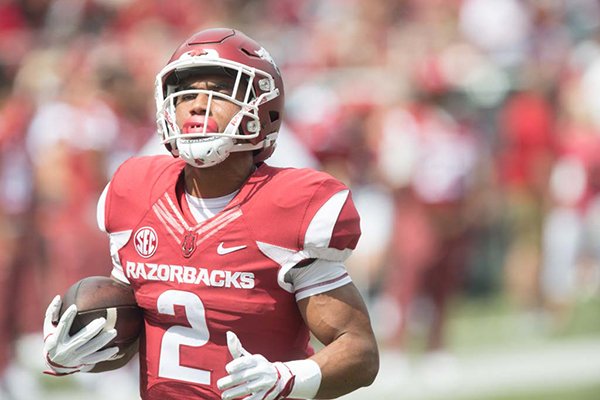Arkansas running back Chase Hayden goes through warmups prior to a game against TCU on Saturday, Sept. 9, 2017, in Fayetteville. 
