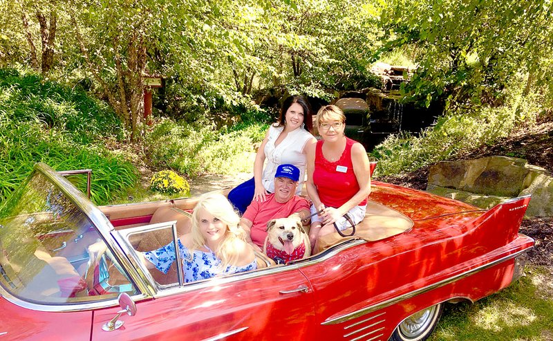 Photo submitted Ride in this and other vintage convertibles by donating $5 to one of three local nonprofits featured at Heroes and Hamburgers celebration on Sep 30. Pictured in the 58 Cadillac are Simple Pleasures Events Director Tara Hammerstrom (behind the wheel), BV Courtesy Van President Bill Puskas (in the back seat); Village House Director Sara Scott (top left) and BV Animal Shelter Executive Director Deidre Knight-Matney, with shelter dog Siggy..