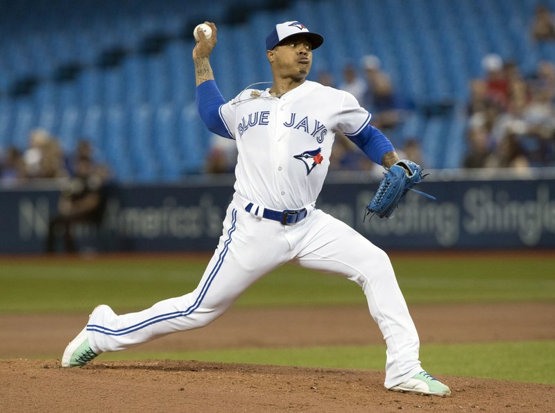 Toronto Blue Jays starting pitcher Marcus Stroman throws against the Kansas City Royals during the first inning of a baseball game, Tuesday, Sept. 19, 2017 in Toronto. (Fred Thornhill /The Canadian Press via AP)