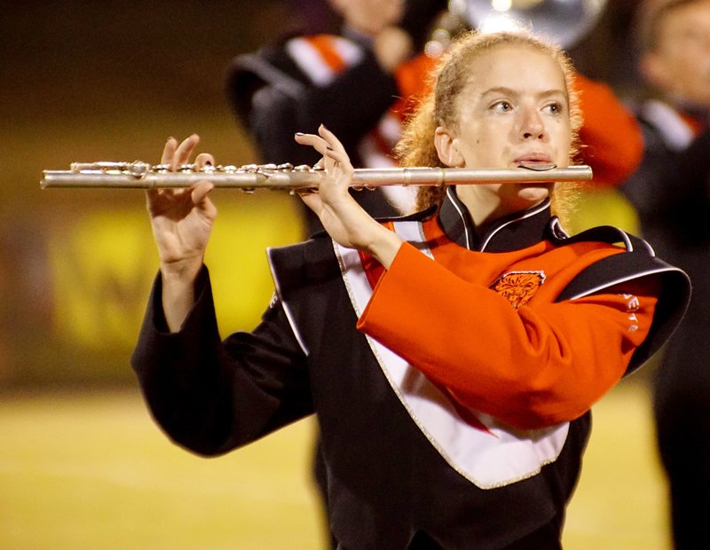 Tabitha Crawley played a special flute part during the halftime performance of the Lion Marching Band at Gravette's home game on Sept. 8