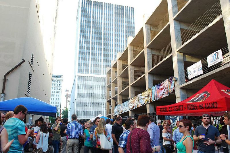 The Downtown Little Rock Partnership’s Alley Party series lures Little Rock residents to explore some of the “tucked away” spots in the capital city. Today’s party will be next to the Little Rock Tech Park on Main Street. 