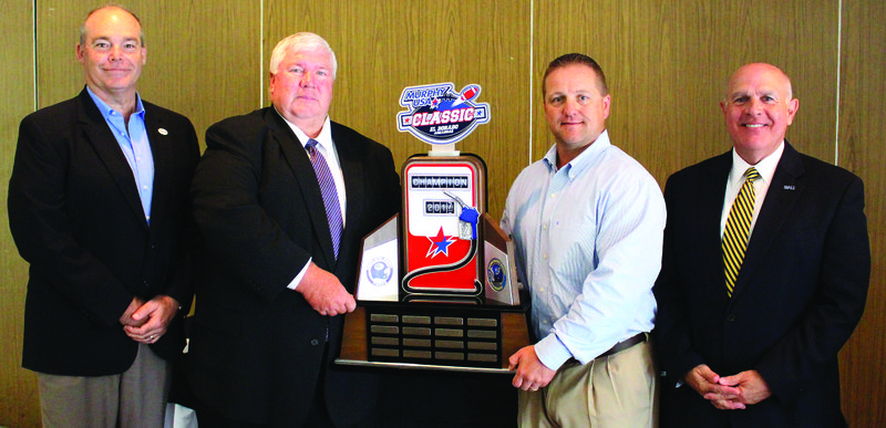 Who will take the trophy?: Officials from Southern Arkansas University and Ouachita Baptist University met in El Dorado Tuesday for the announcement of the 2017 Murphy USA Classic game – a match-up between the two teams to decide who gets to take home the trophy on Nov. 4. Don Miller, director of category management at Murphy USA, from left; David Sharp, OBU athletic director; Steve Browning, athletic director at SAU and Dr. Trey Berry, president of SAU, attended a luncheon to formally announce this year’s game.