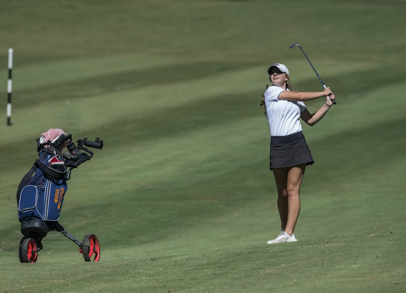 NWA Democrat-Gazette/SPENCER TIREY Rogers Heritage golfer Kennedy Walters hits a shot during a meet against Bentonville, Thursday Sept. 7, 2017. She made the state tournament as a freshman, but is looking for more this season.