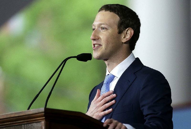 In this May 25, 2017, file photo, Facebook CEO Mark Zuckerberg delivers the commencement address at Harvard University commencement exercises in Cambridge, Mass.