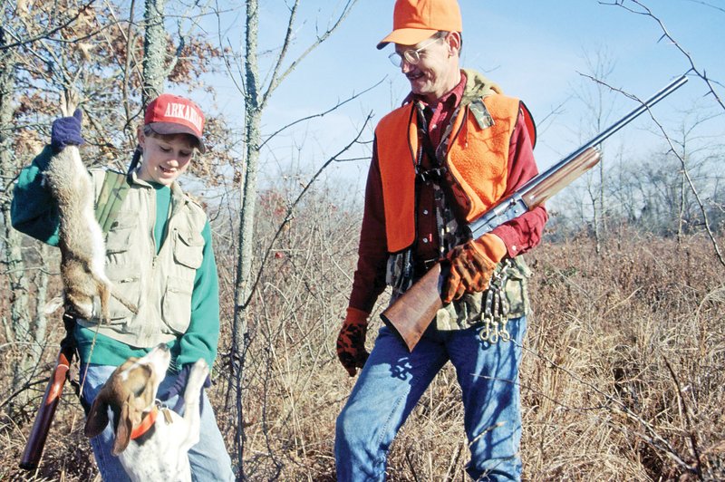 The upland habitat on the Scatter Creek Wildlife Management Area provides a great place to turn out some beagles and enjoy a good cottontail chase like Lewis, left, and Jordan Peeler of Vanndale did.