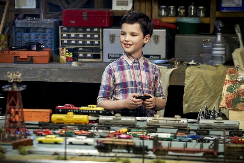 Young Sheldon stars Iain Armitage (Big Little Lies) as 9-year-old genius Sheldon Cooper. He’s shown here in his favorite pastime, playing with trains.