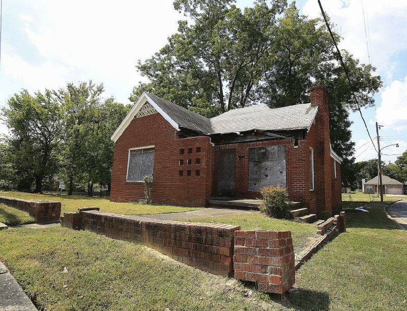 The former home of Carlotta Walls LaNier, at 1500 S. Valentine St. in Little Rock, was bombed in 1960 and now sits abandoned. 