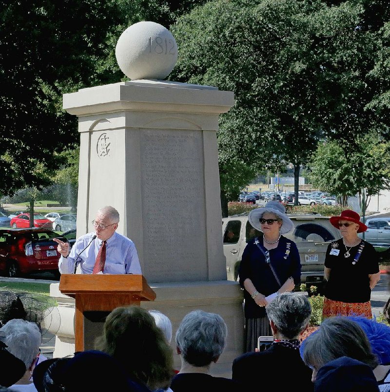 University of Arkansas at Fort Smith professor Billy Higgins speaks Friday at a rededication event for the state’s War of 1812 Memorial Fountain, during which the Arkansas chapter of the U.S. Daughters of the War of 1812 honored Peter Caulder, the first black soldier to have his name added to the fountain. 