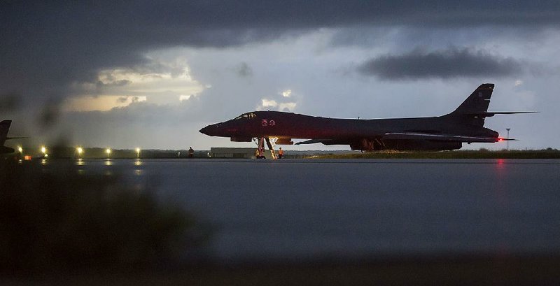 A U.S. Air Force B-1B bomber prepares for takeoff Saturday at Andersen Air Force Base on the South Pacific island of Guam. Bombers from the base, along with F-15 fighter escorts from Okinawa, Japan, flew over international waters near North Korea, farther north of the demilitarized zone than any U.S. aircraft had gone this century.