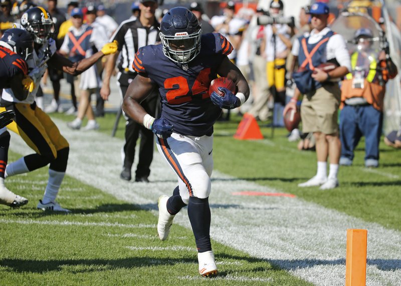 Chicago Bears running back Jordan Howard (24) runs to the end zone for a touchdown in overtime of an NFL football game against the Pittsburgh Steelers, Sunday, Sept. 24, 2017, in Chicago. The Bears won 23-17 in overtime. 