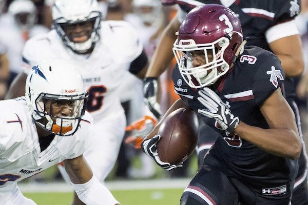 New Mexico State's Larry Rose III runs with the ball against UTEP during an NCAA college football game Saturday, Sept. 23, 2017, Las Cruces, N.M. (Robin Zielinski/The Las Cruces Sun-News via AP)