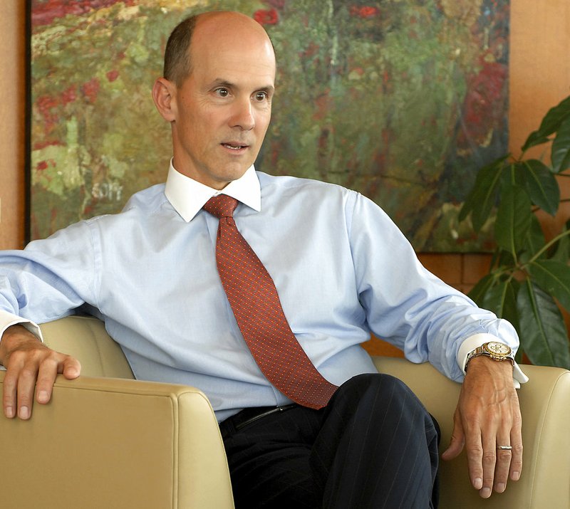 In this May 30, 2007, file photo, Equifax CEO Richard Smith poses for a photo at the Equifax headquarters in Atlanta.