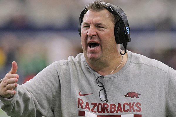 Arkansas coach Bret Bielema yells to players during a game against Texas A&M on Saturday, Sept. 23, 2017, in Arlington, Texas. 