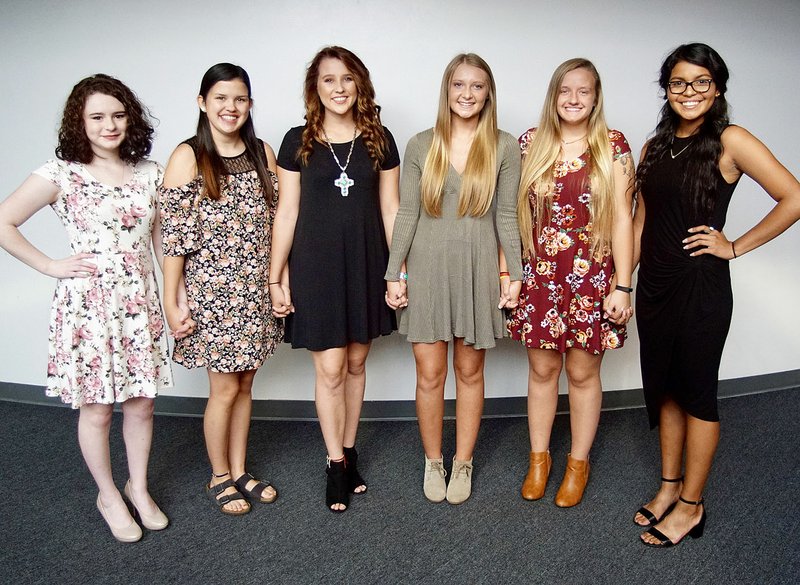 Photo by Randy Moll Senior maids vying for the honor of being crowned Gentry High School homecoming queen on Friday are Haylee Pyburn (left), Abby Asencio, Karadie Ory, Lauren Fowler, Alexis Droddy and Jennifer Carrera.