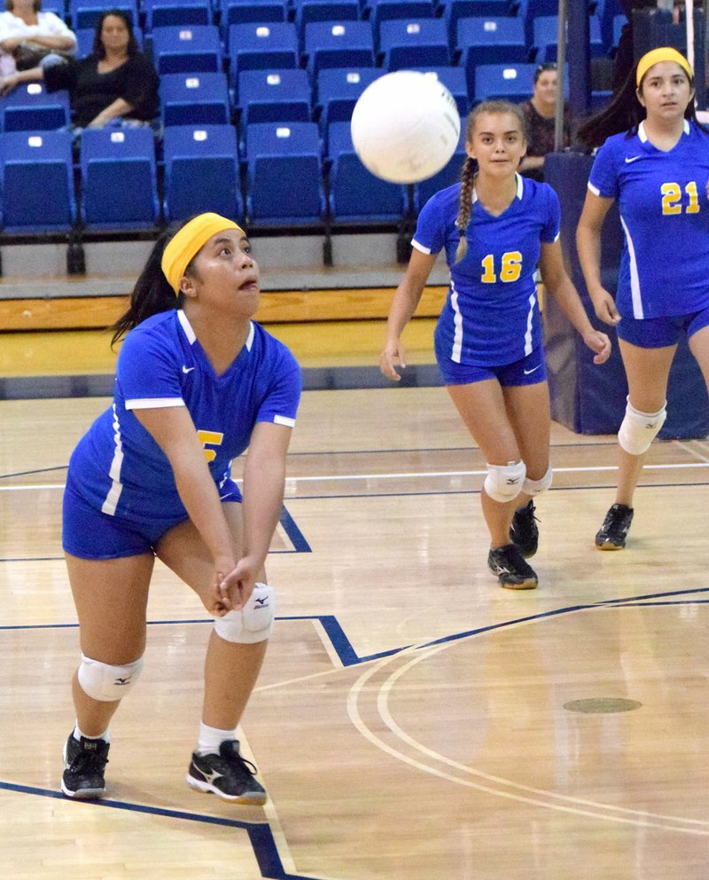 Photo by Mike Eckels Decatur&#8217;s Mathline Jesse dove toward the ball for a dig during the second set of Decatur&#8217;s game at Shiloh Christian in Springdale Sept. 21.