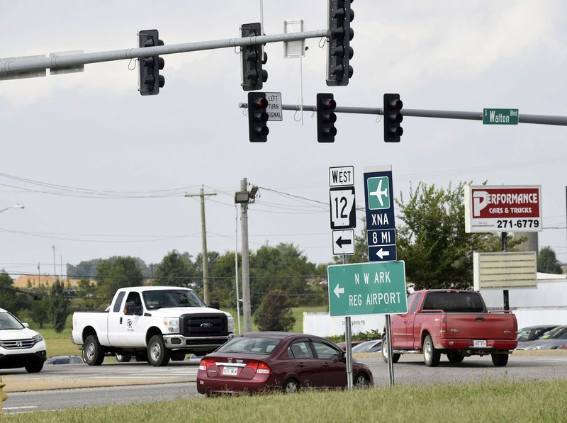 NWA Democrat-Gazette/FLIP PUTTHOFF Officials are considering adding a second right turn lane from Southwest Regional Airport Boulevard on to South Walton Boulevard.