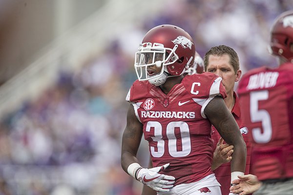 Arkansas defensive back Kevin Richardson walks toward the sideline during a game against TCU on Saturday, Sept. 9, 2017, in Fayetteville. 