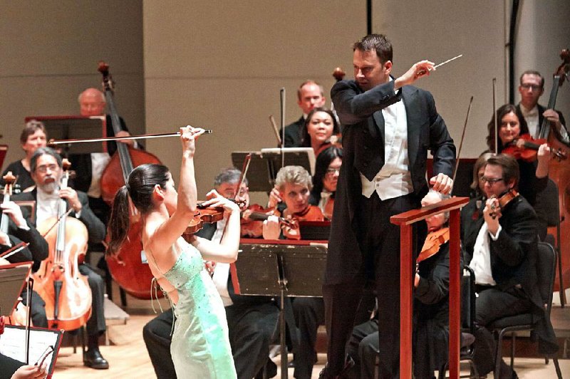 Violinist Jennifer Frautschi performed Samuel Barber’s Violin Concerto with the Arkansas Symphony guest conductor Robert Moody in October 2013 at what was then called Robinson Center Music Hall.
