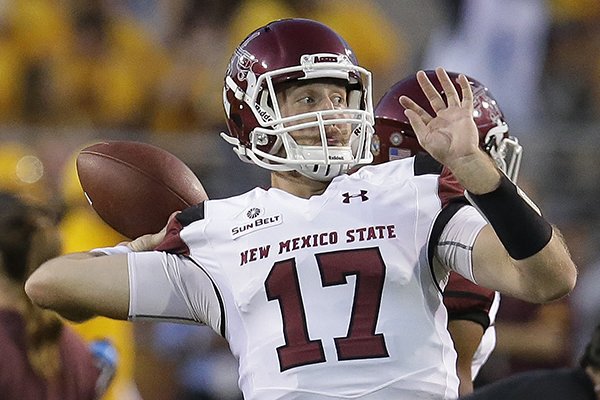 New Mexico State's Tyler Rogers (17) warms up before a football game against Arizona State, Thursday, Aug. 31, 2017, in Tempe, Ariz. (AP Photo/Rick Scuteri)

