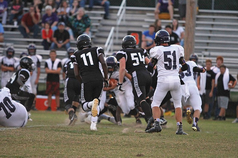 Terrance Armstard/News-Times Smackover's K.J. King (11) and Hunter Goocher (54) close in on Fouke's Jarret Easley (24) during their 6-3A clash last Friday in Smackover. After topping the Panthers to snap a two-game losing streak, Smackover will play at Lake Village on Friday. Game time is set for 7 p.m.