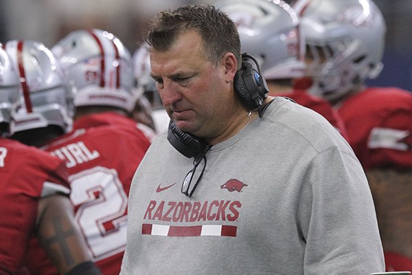 Arkansas coach Bret Bielema stands on the sideline during a game against Texas A&M on Saturday, Sept. 23, 2017, in Arlington, Texas. The Razorbacks lost 50-43 in overtime to the Aggies, marking Arkansas' 12th one-score defeat under the fifth-year coach.