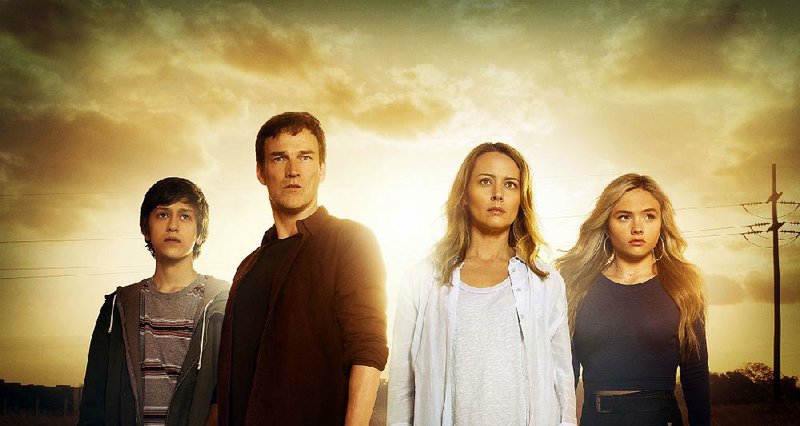 On the run. Fox’s The Gifted stars (from left) Percy Hynes White, Stephen Moyer, Amy Acker and Natalie Alyn Lind. The highly anticipated science fiction drama debuts at 8 p.m. Monday.
