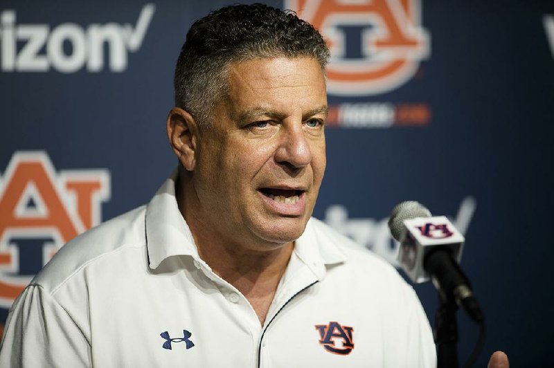 Auburn head coach Bruce Pearl speaks during an NCAA college basketball press conference, Friday, Sept. 29, 2017, in Auburn, Ala. Pearl spoke to reporters for the first time since top assistant Chuck Person's arrest as part of a federal fraud and bribery sting. 